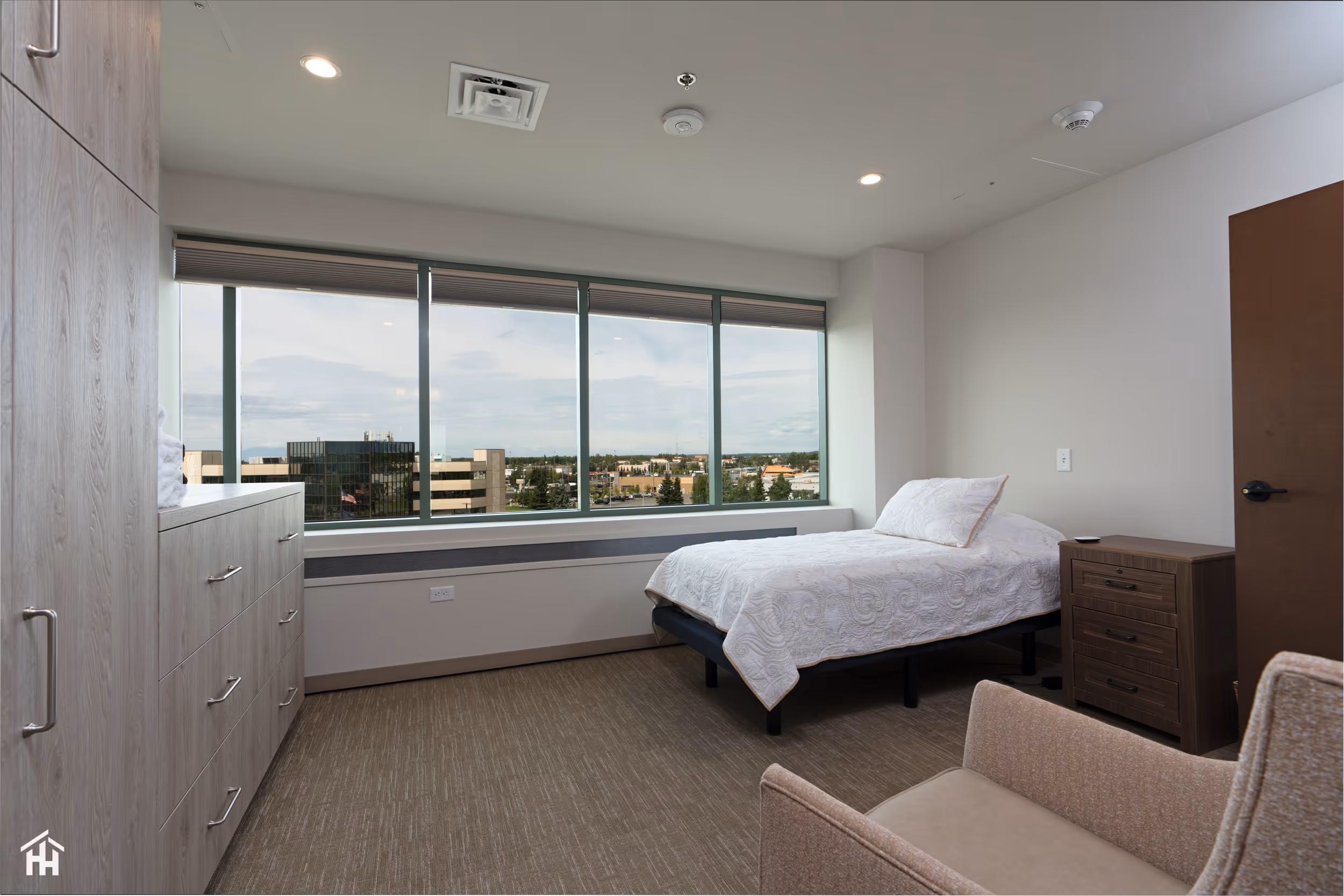 Interior living space for The Emerald resident rooms.