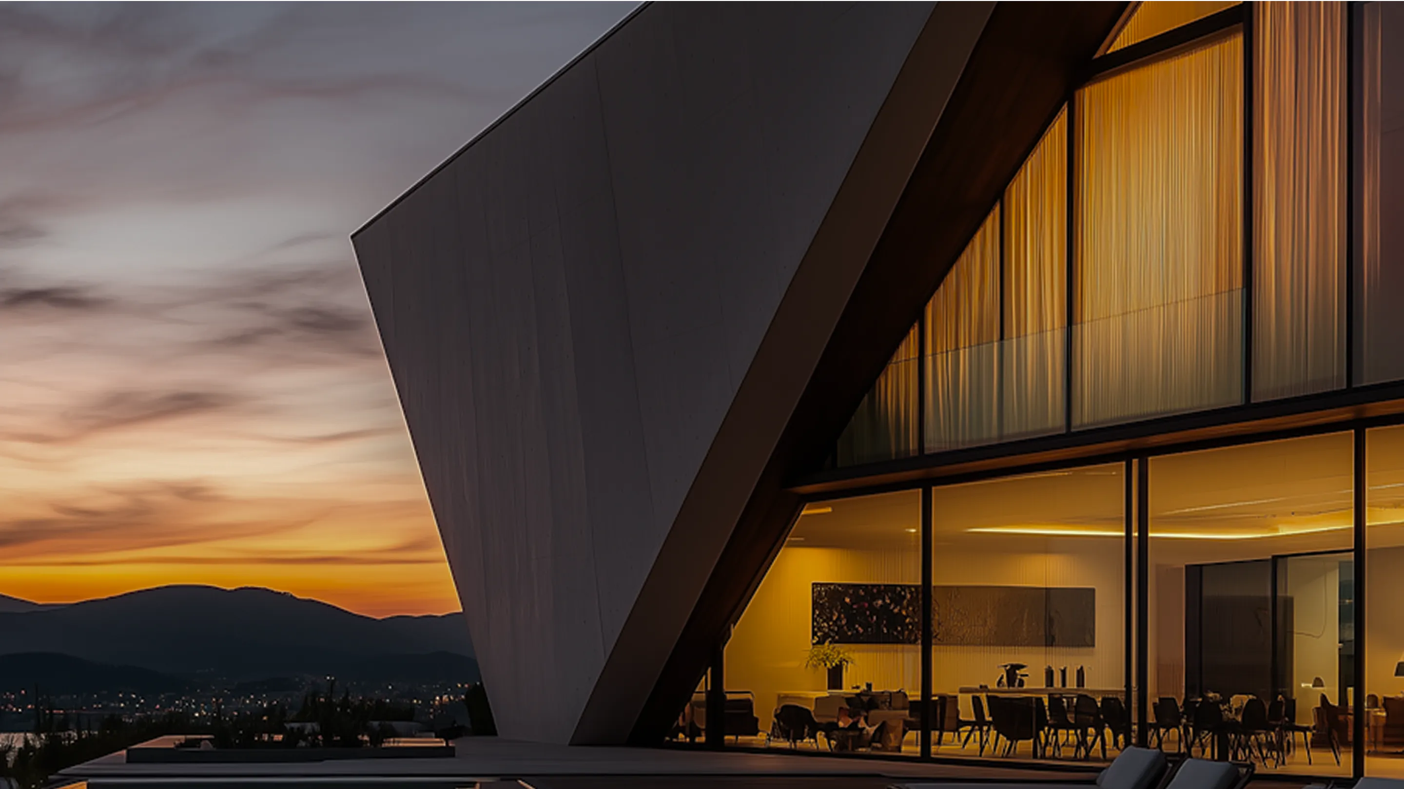 Modern architectural design features a stunning angular facade and warm interior lighting at sunset.
