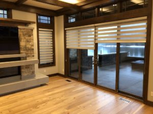 Interior design of living room with blinds window. 