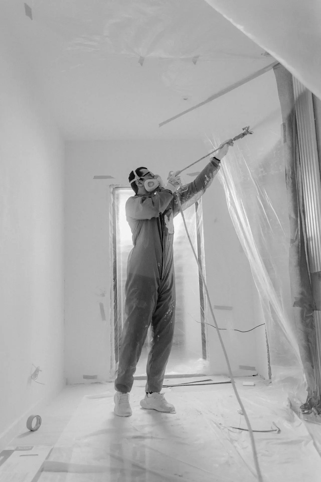 man painting the wall