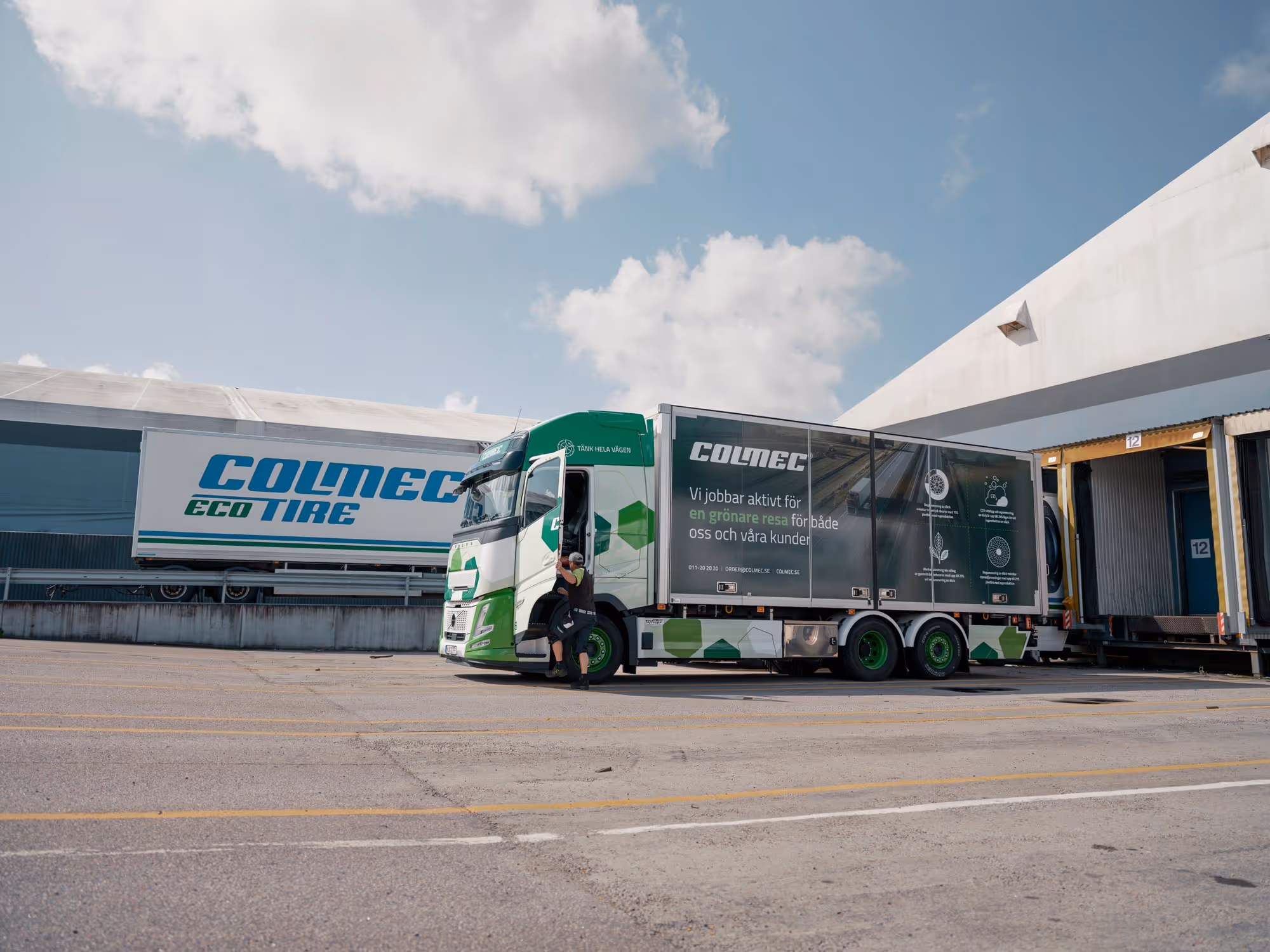 large truck outside facility for refurbished wheels