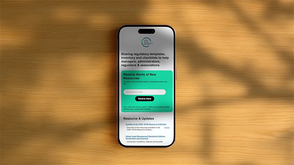 Smartphone on wooden surface showing a regulatory templates sharing app with subscription form for alerts and resource updates.