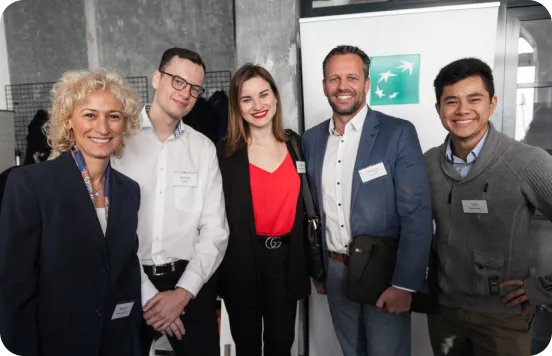 Kinga Stanislawska on the photo with partners. Business men and women.