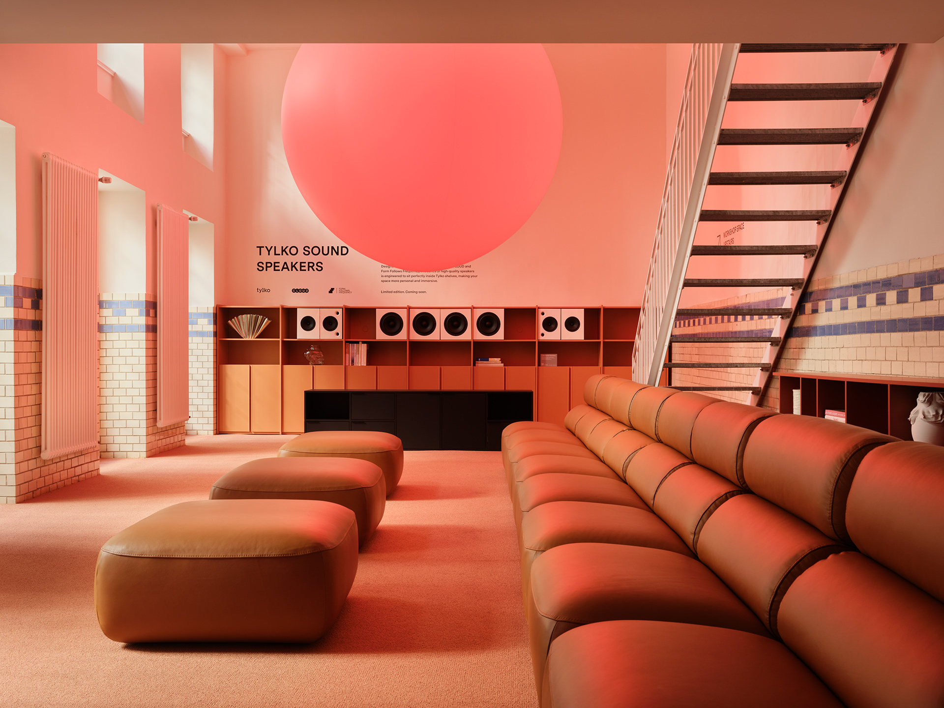 Modern living room interior with an orange sofa and wooden wall shelving