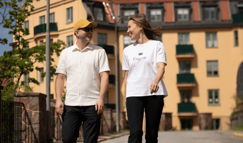 Two men standing together outside a building