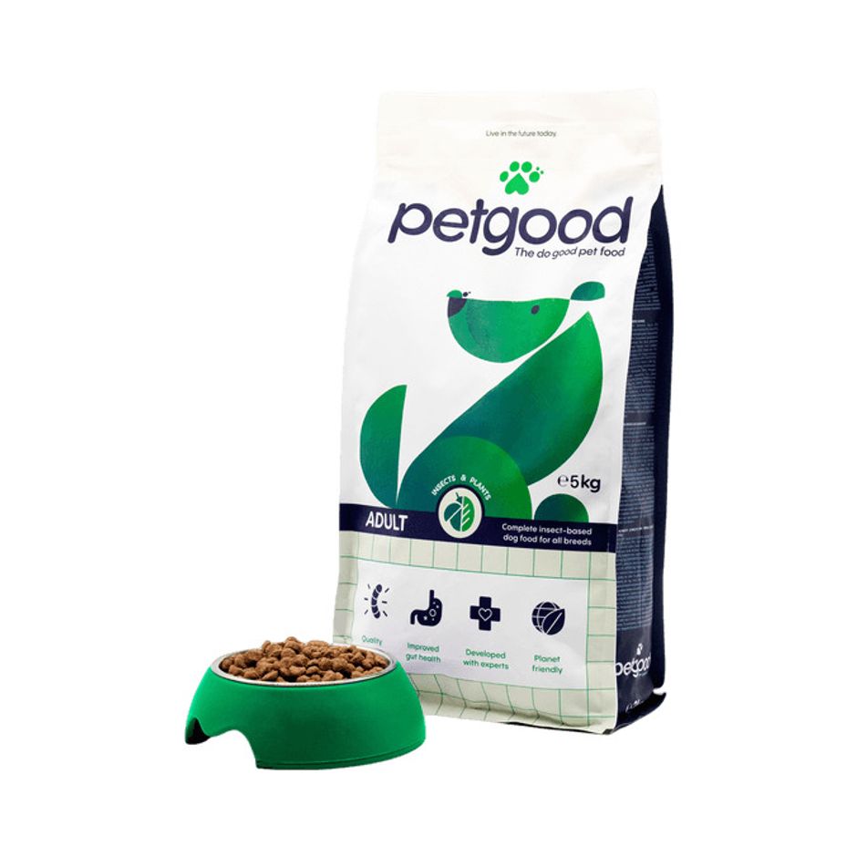 Petgood insect-based dog food package next to a bowl of kibble