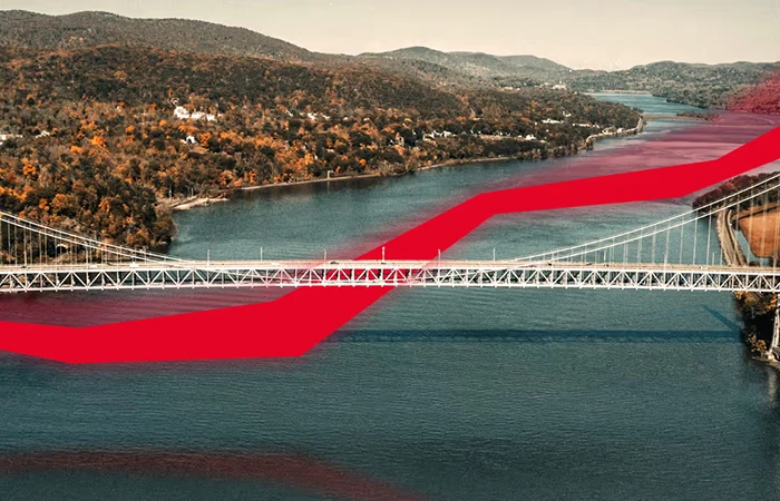 Bridge over a river with a red stripe through the image.