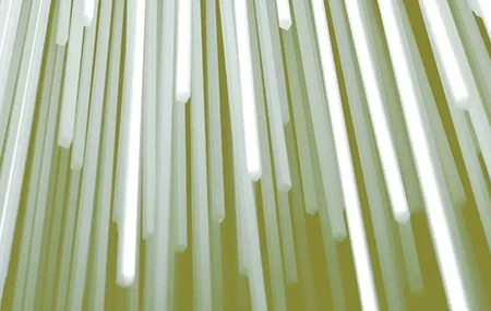 Bright vertical light bars of varying lengths hang against a yellowish-green background.