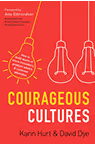 Book cover for 'Courageous Cultures' by Karin Hurt and David Dye, with a foreword by Amy Edmondson. The red cover features yellow and white lightbulb illustrations, with one lightbulb highlighted and radiating lines. Text describes how to build teams of micro-innovators, problem solvers, and customer advocates.