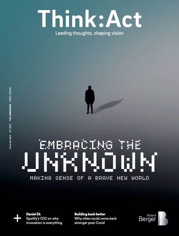 Think:Act Magazine cover with a dark background and a central image of a lone human silhouette casting a long shadow. The headline “EMBRACING THE UNKNOWN” appears in a pixelated font, with the subheading “MAKING SENSE OF A BRAVE NEW WORLD” below it. 