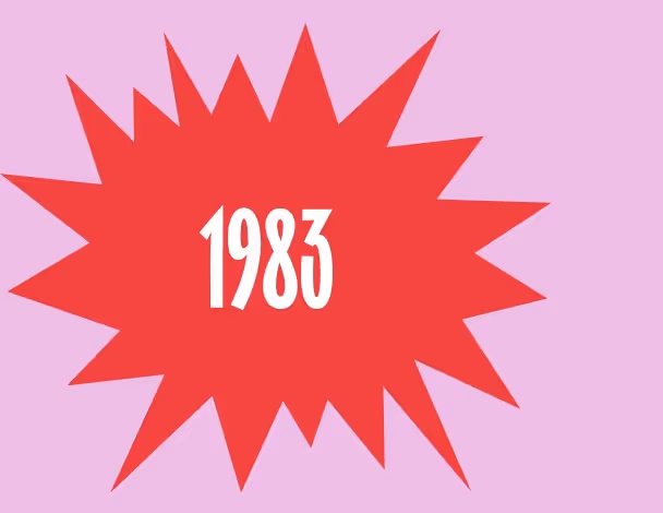 Red starburst or explosion-shaped design with white text reading '1983' centered inside.