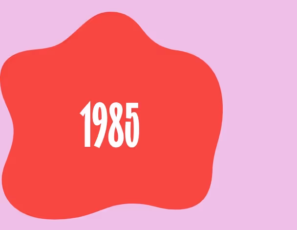 Red blob or organic-shaped design with white text reading '1985' centered inside.