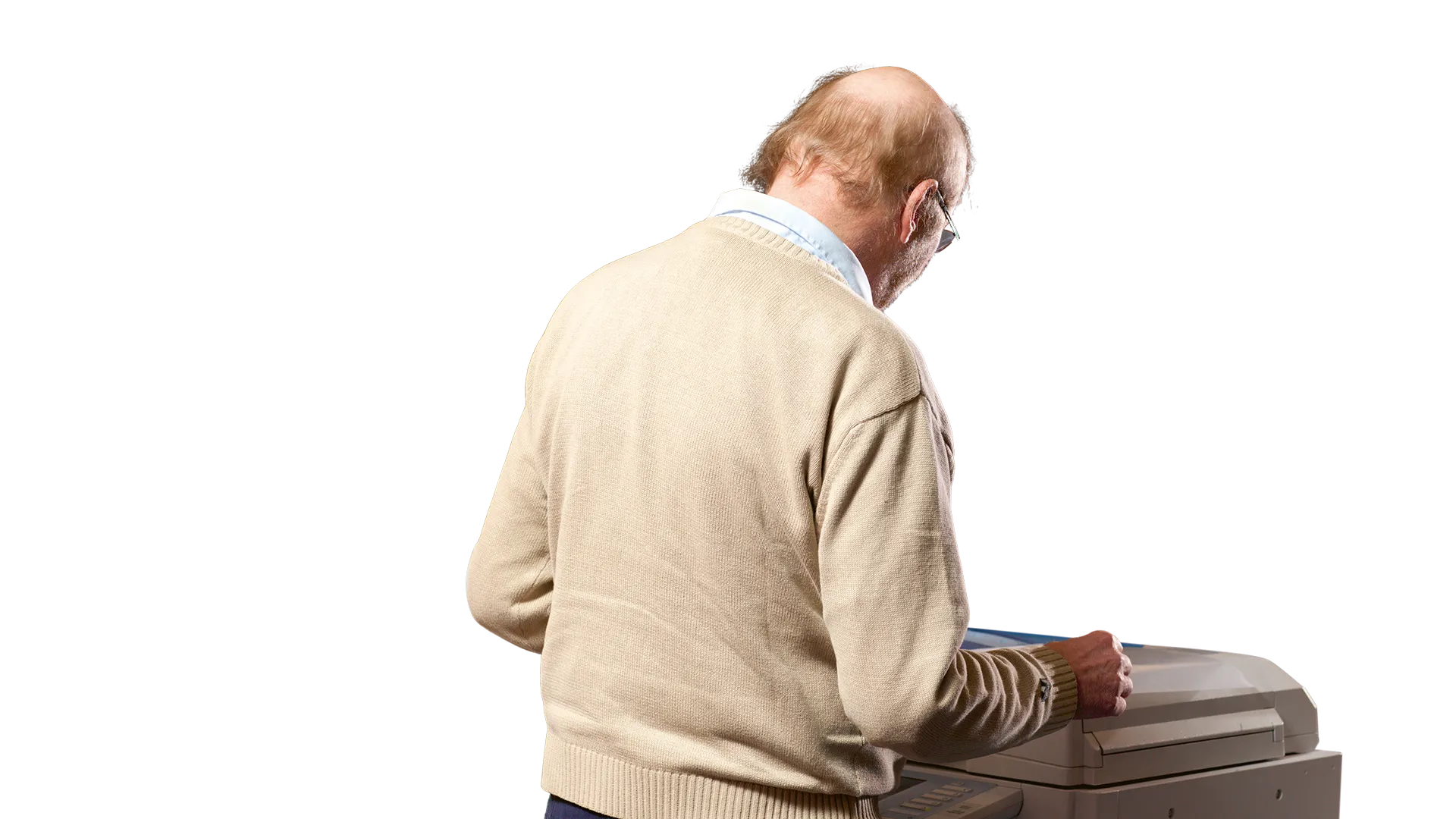 A cropped image showing an older, balding man behind a copy machine. 
