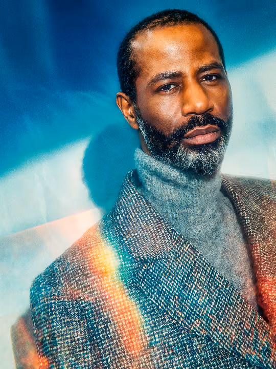Hamilton Mann, tech executive and author of "Artificial Integrity," in a close-up stylized portrait with teal lighting.