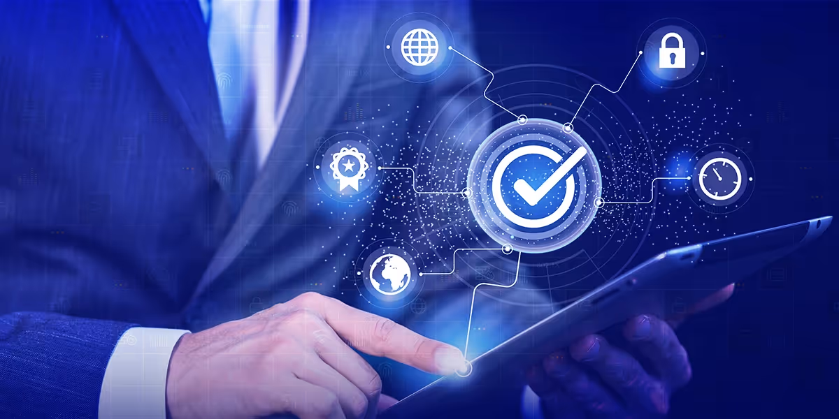 Business professional using tablet with cybersecurity and compliance icons overlay.