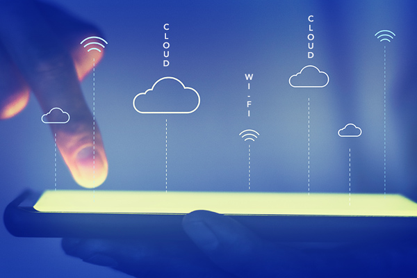 hand pointing at tablet with blue background