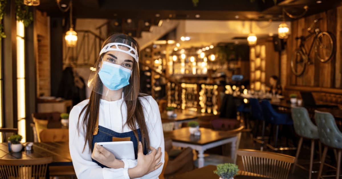 girls with mask in restaurant