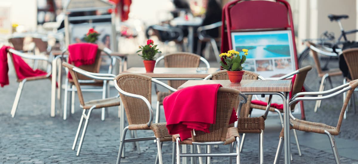 open area of restaurant with chairs and table