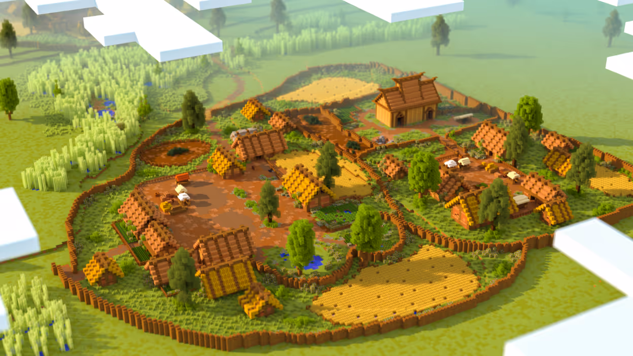 Minecraft-stiliserad modell av en medeltida by med hus, åkrar, träd och ett trästaket runt.