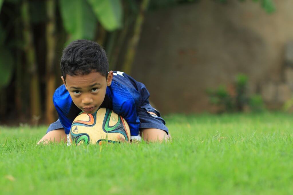 A child who lost a game is now humble 