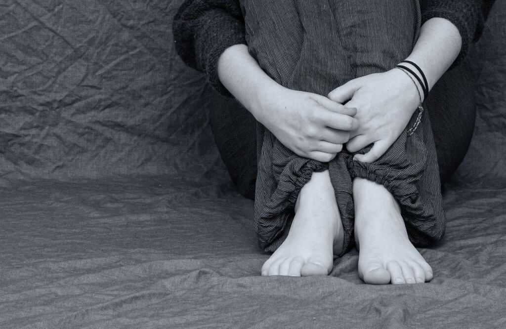A youth feeling social isolation