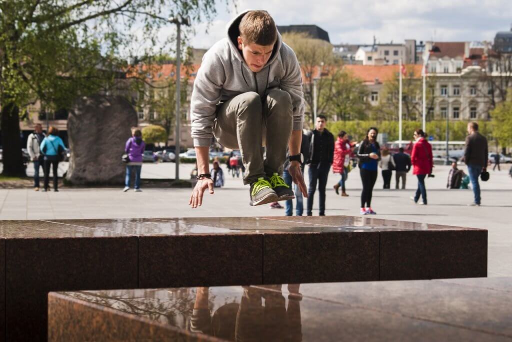 Boy doing Parkour showcasing the benefits of gymnastics 