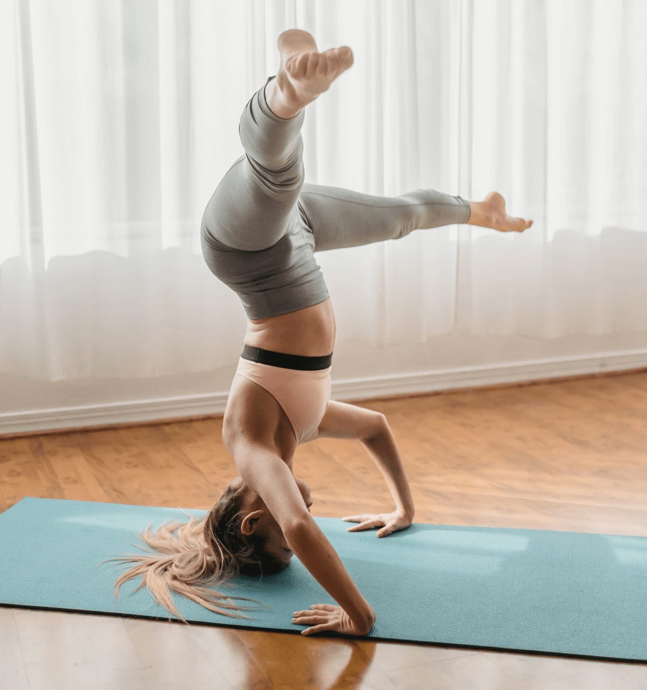 A headstand is one of the beginner gymnastics skills