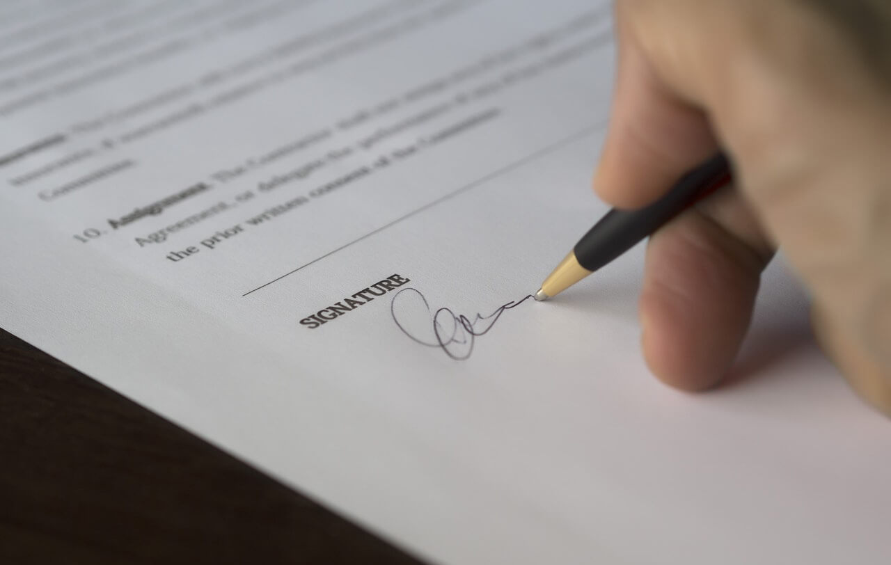 Person signing waiver to start an after school program