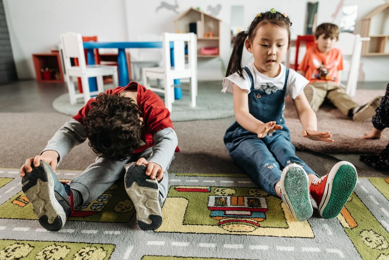 Kids stretching in the classroom