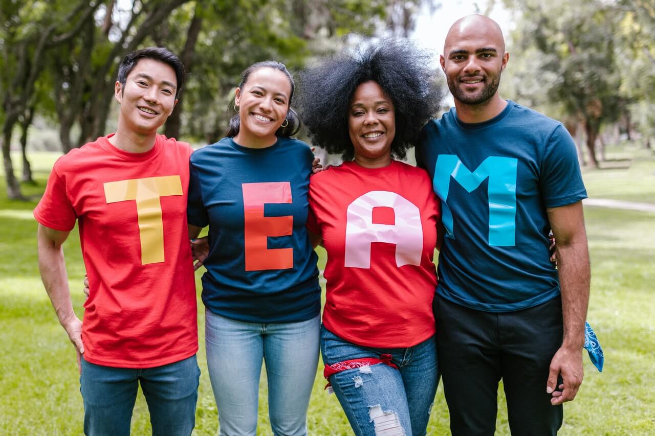 Team members posing at team building exercise