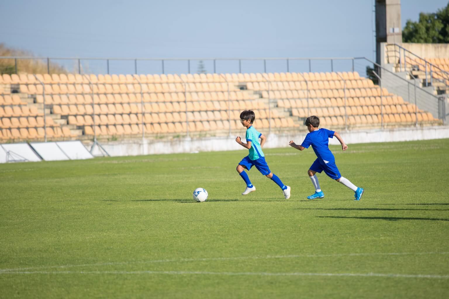 Kids playing soccer at an academy
