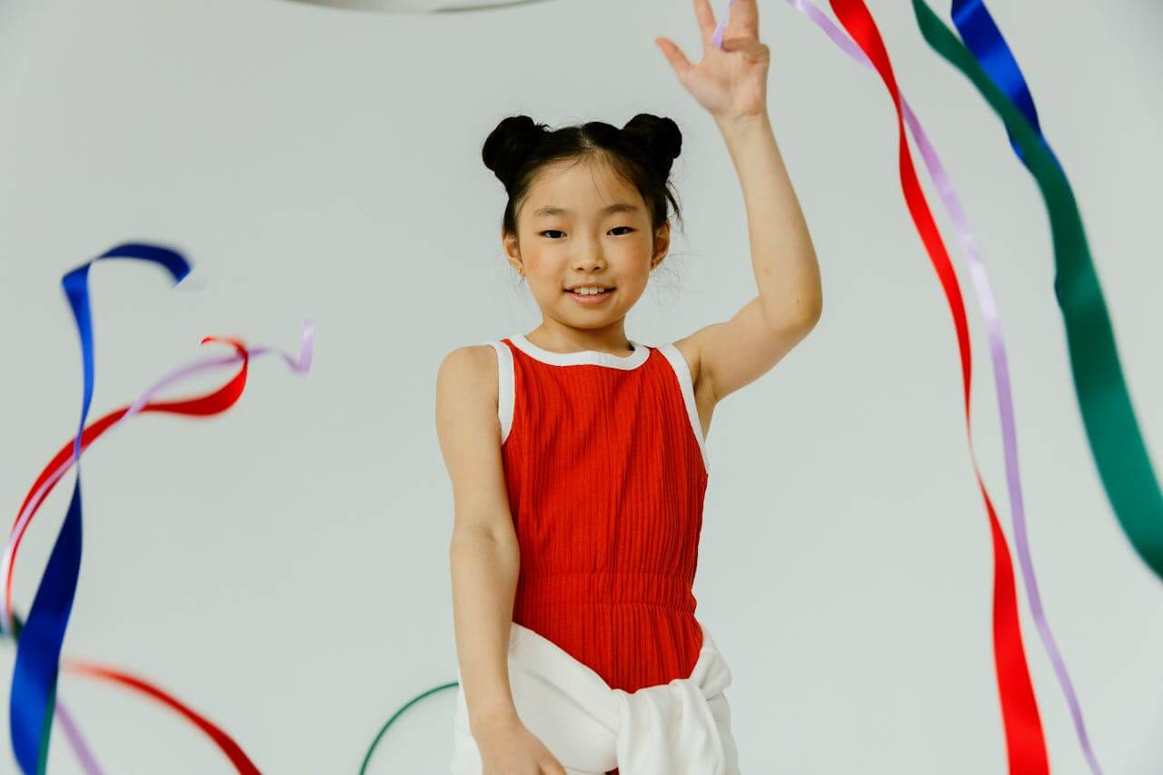 Gymnast practicing ribbon routine. 