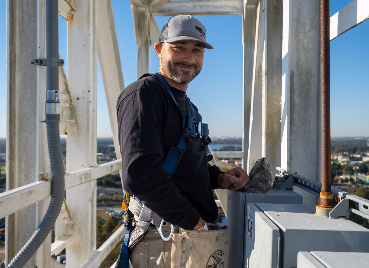 Employee servicing a LED Videoboard system