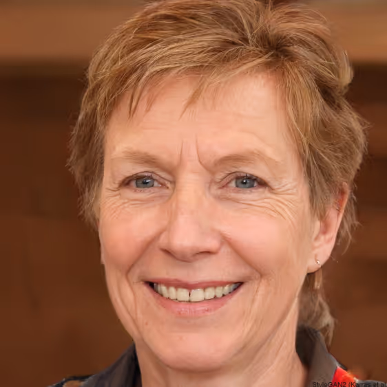 A portrait of Annette, who is a middle-aged woman with glasses and earrings returning to piano with new confidence.