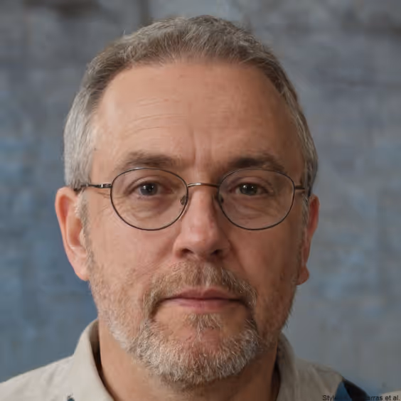 A portrait of Annette, who is a middle-aged woman with glasses and earrings returning to piano with new confidence.