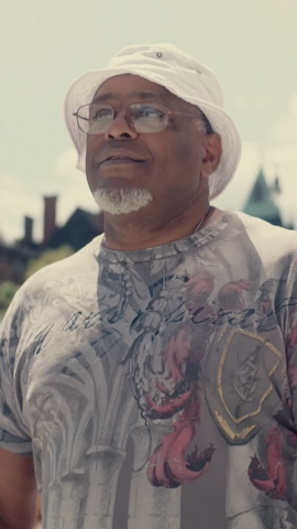 photo of a man in a bucket hat
