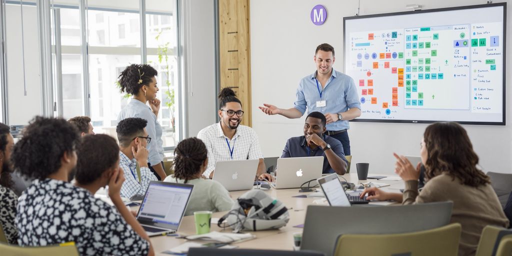 Diverse professionals in a training session for software resellers.