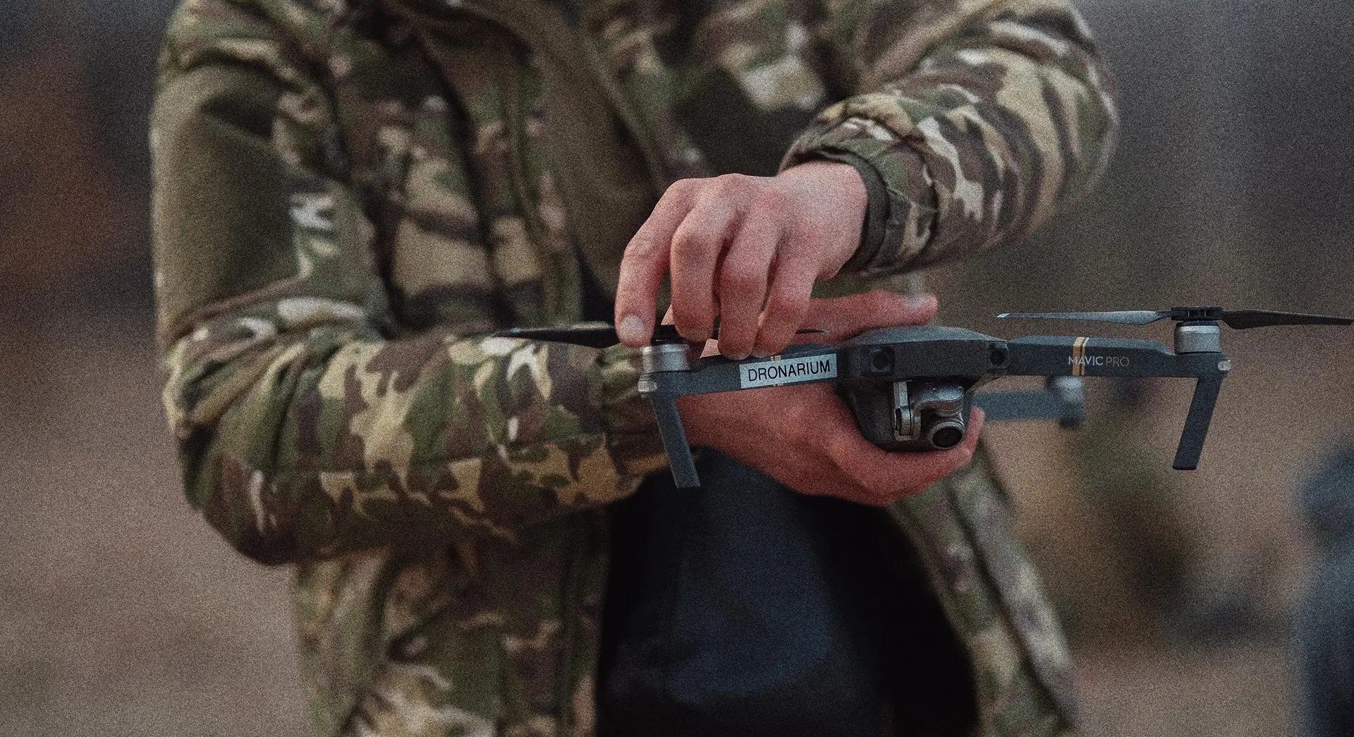 Instructor shows how the drone works