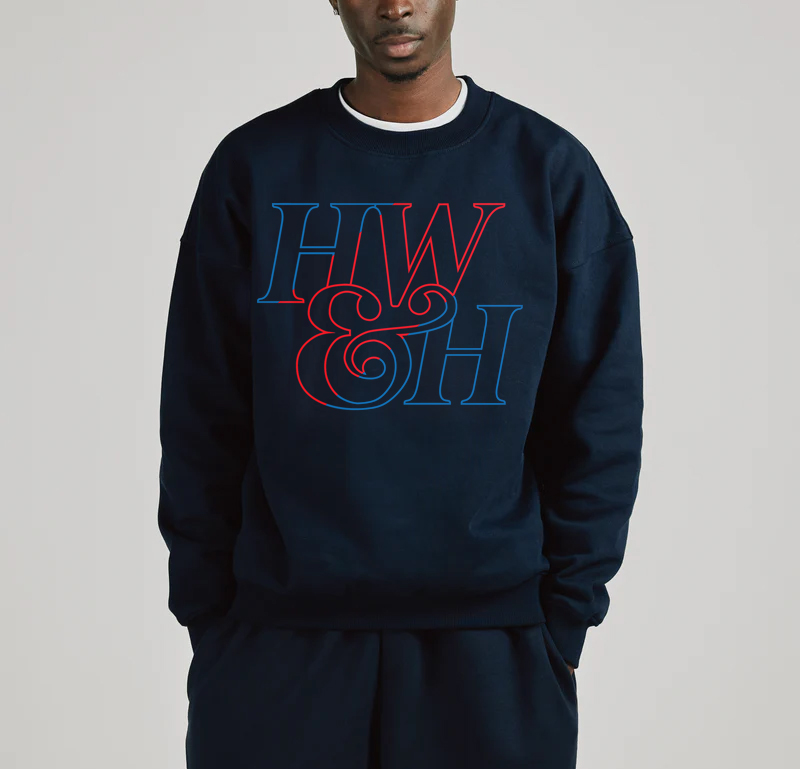 Man wearing a dark blue sweatshirt with High Wide & Handsome logo on it.