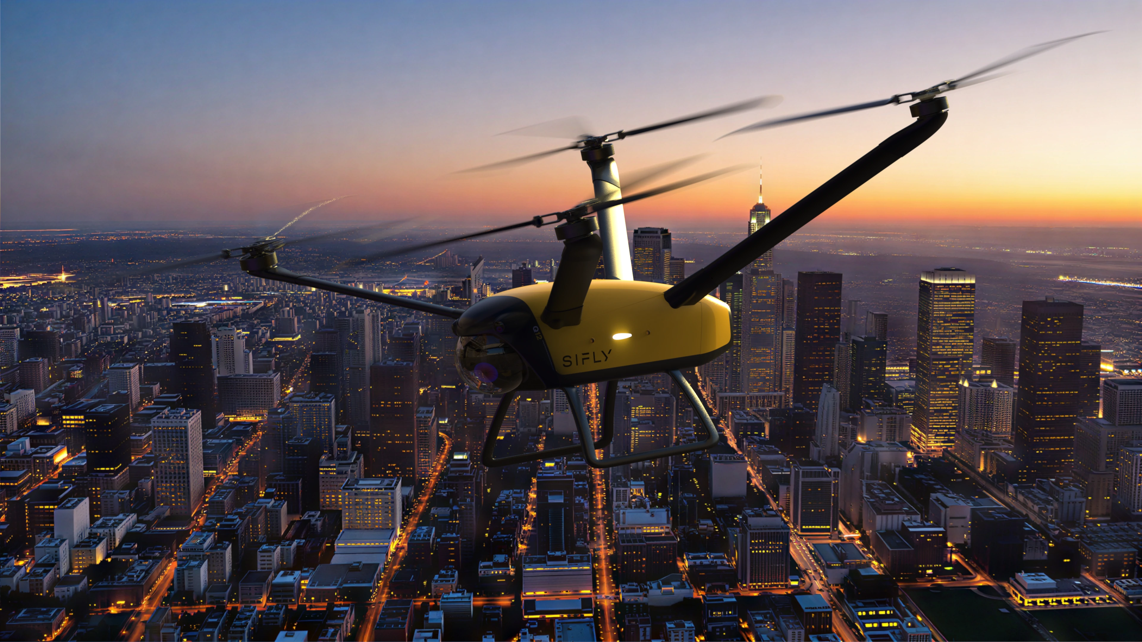 Yellow and black drone flying over a cityscape at sunset with illuminated streets and buildings.