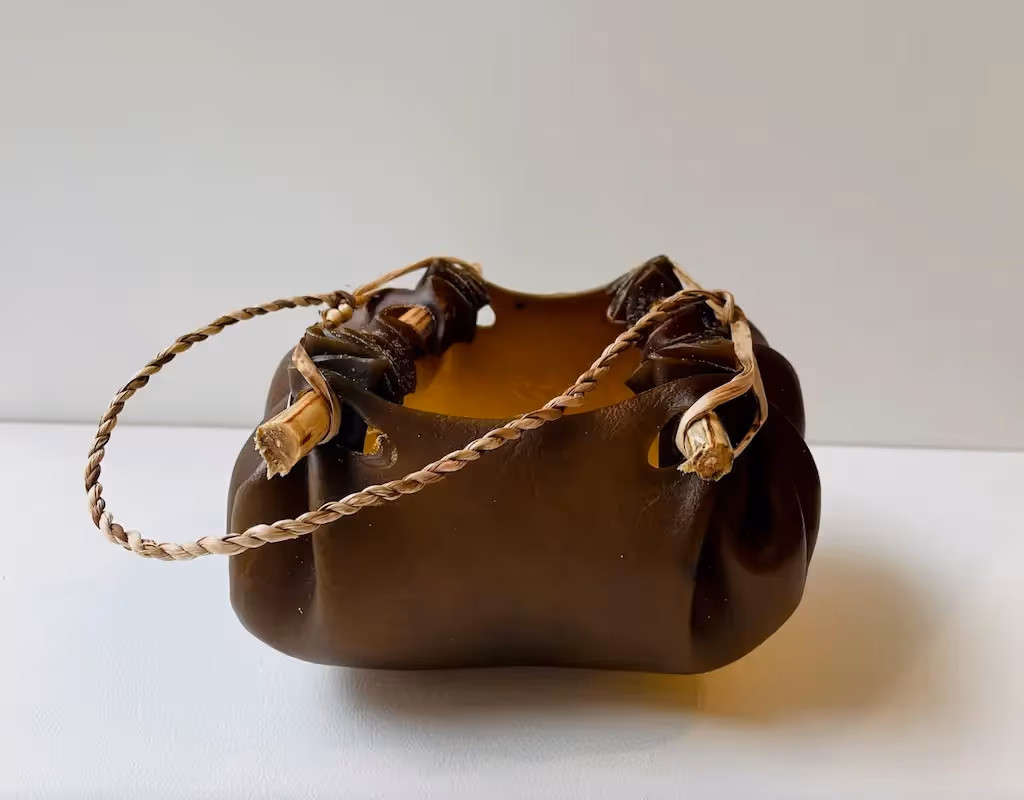 Kelp vessel, 2021, bull kelp, native Tasmanian timber, river reeds, large, 8 x 13 x 10.5 cm (dimensions exclude handle)