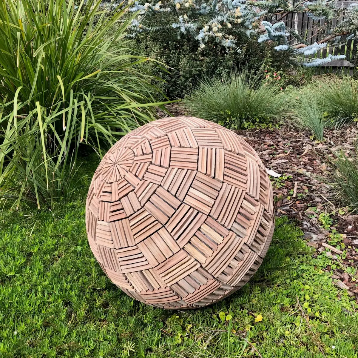 Ben Carroll, Spotted gum sphere, 2021, spotted gum tongue-in-groove flooring, 56 cm diameter