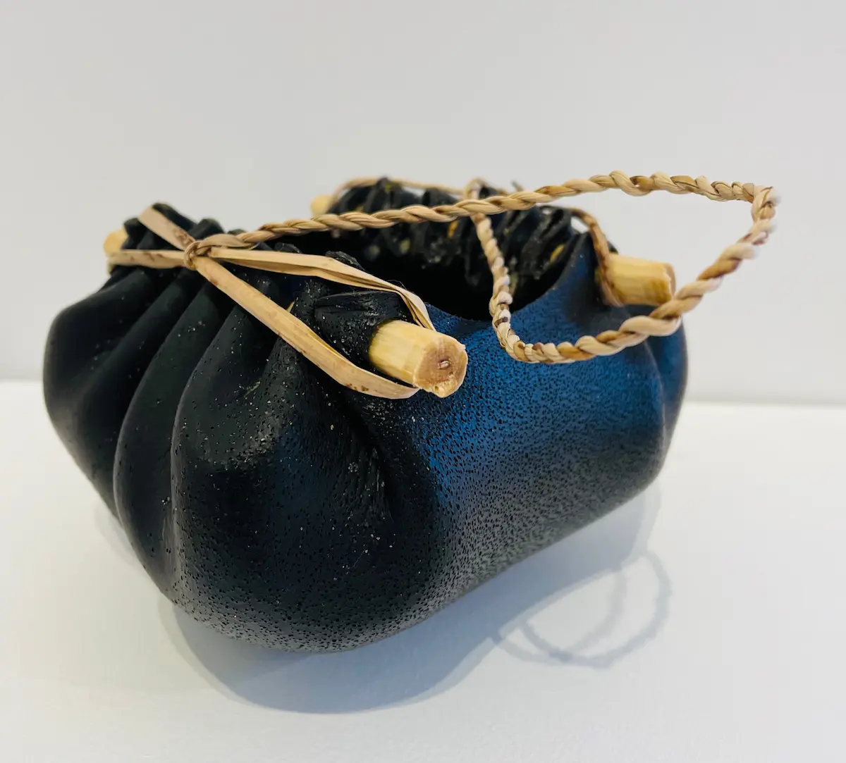 Kelp vessel, 2021, bull kelp, native Tasmanian timber & river reed, large, 8.5 x 13 x 12 cm (dimensions exclude handle)