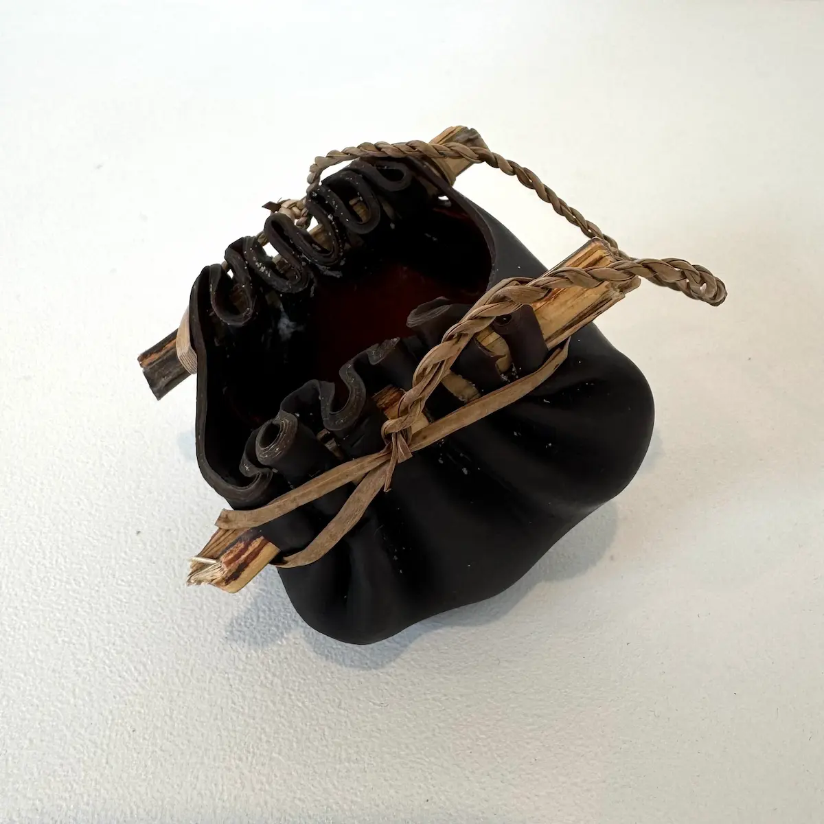 Kelp vessel, 2022, bull kelp, native Tasmanian timber & river reed, small, approximately 5 x 8 x 7 cm (dimensions exclude handle)