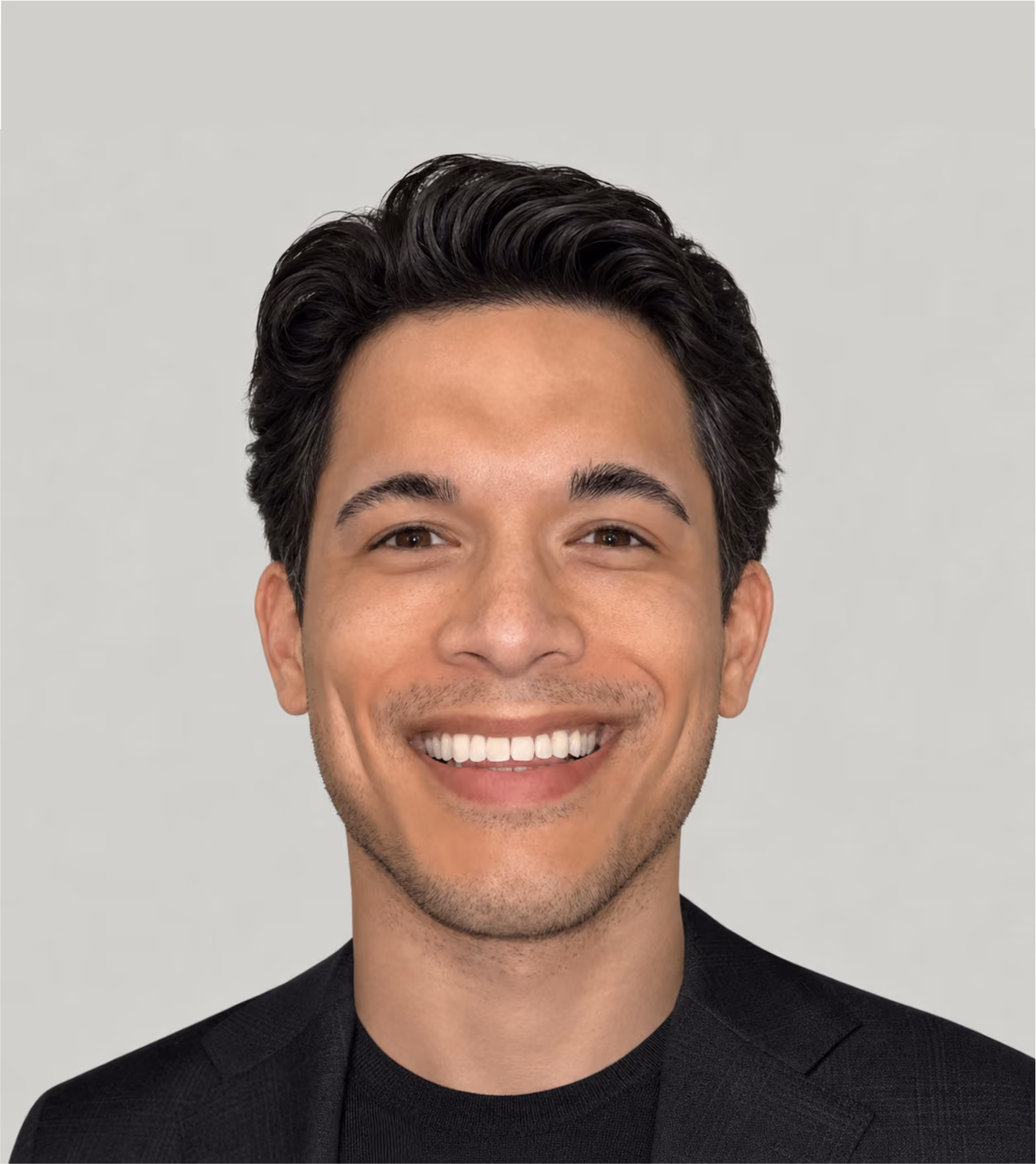 Male smiling with dark background wearing floral shirt