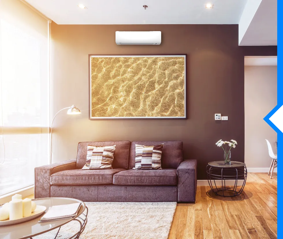 Modern living room with brown sofa, gold artwork, and large window
