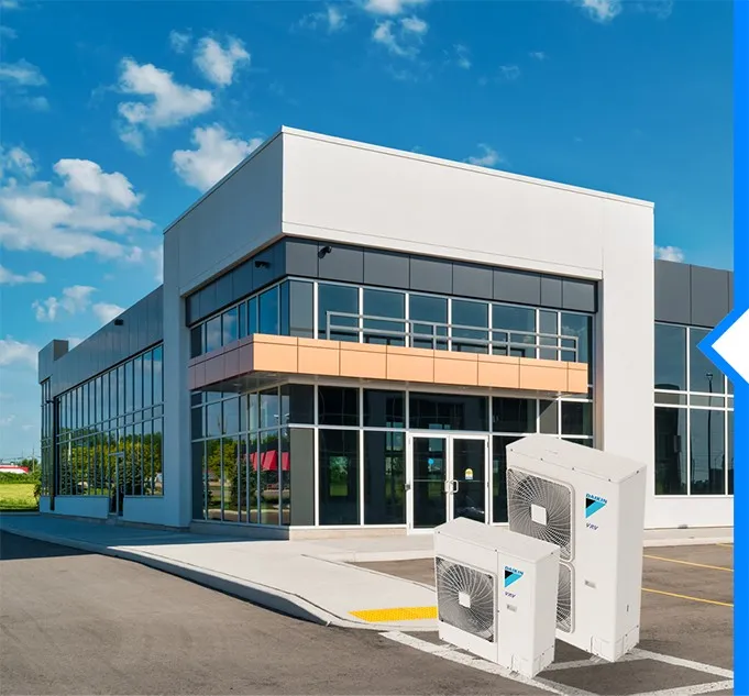 Two different-sized Daikin VRV outdoor air conditioning units are shown in front of a modern commercial building with large glass windows.