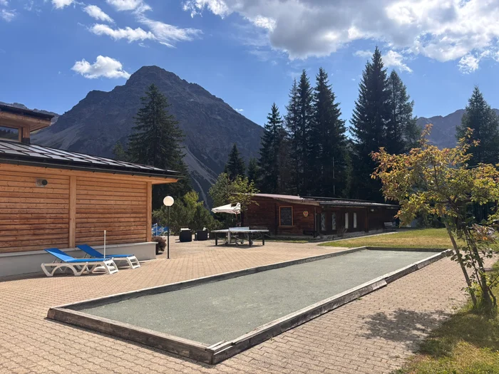 The boccia lane on the terrace at Altein, Arosa, with the mountains behind