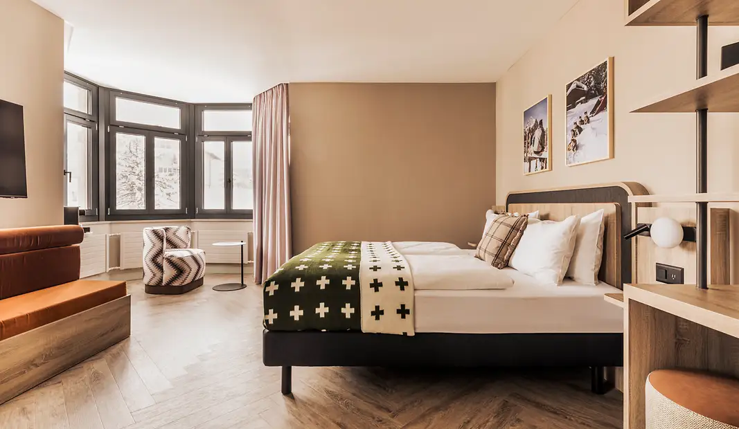 Maxi triple room mountain view faern arosa altein resort & spa swiss alps