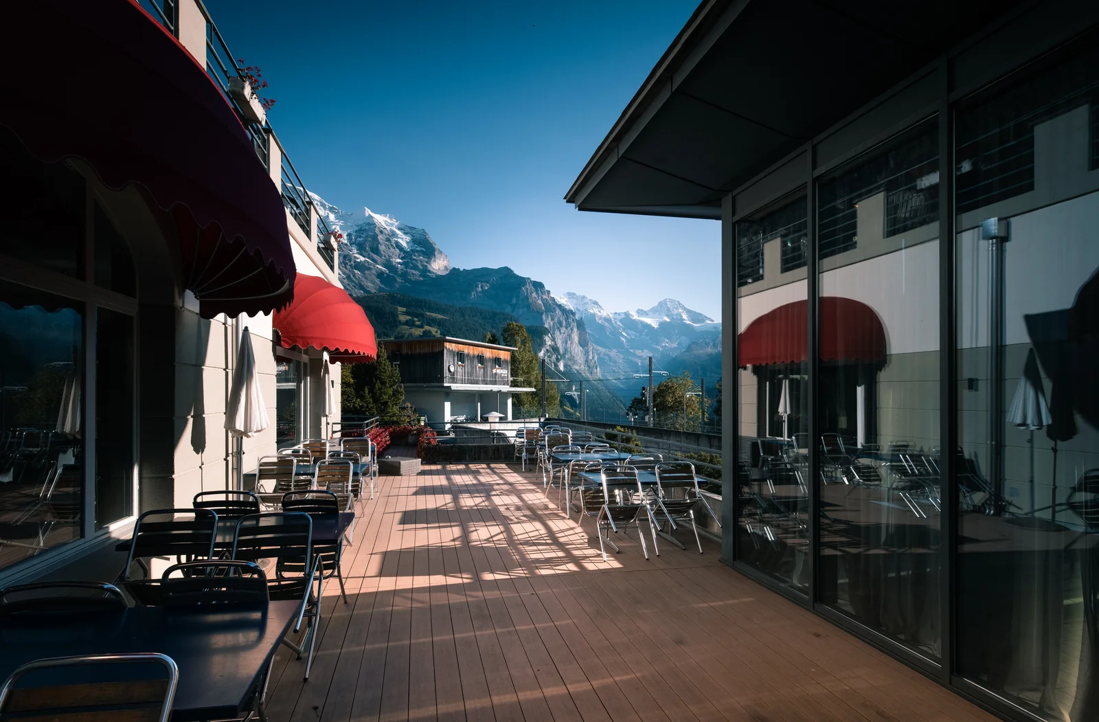 Sun terrace of Victoria Lauberhorn, Wengen with views across the Lauterbrunnen Valley